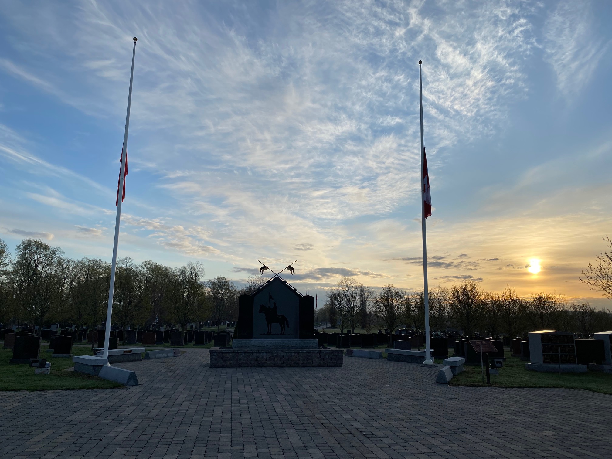 RCMP NMC Flags at half-staff